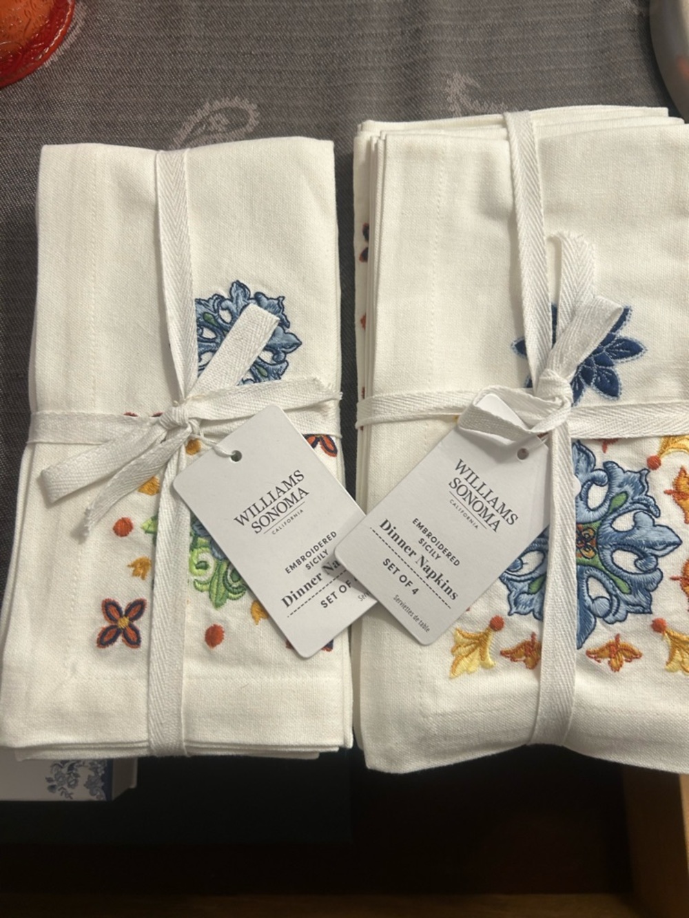 NWT Williams Sonoma White Dinner Napkins with Blue, Green and Yellow Embroidery